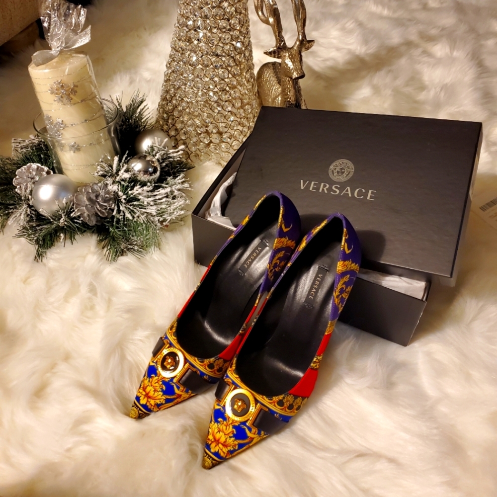 Versace- 4 inch heels never worn